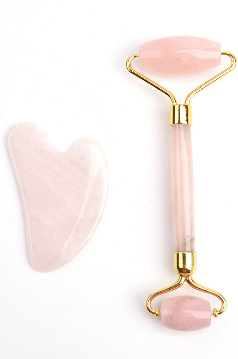 Face roller with heart-shaped rose quartz Gua Sha stone