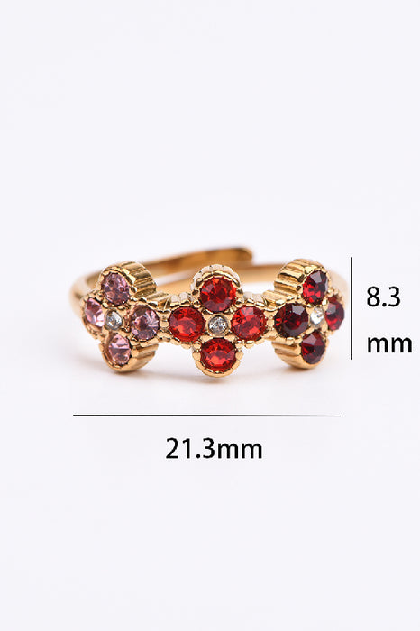 Ring Edelstahl vergoldet 3 Blumen Zirkonia Klasse 5A Rottöne