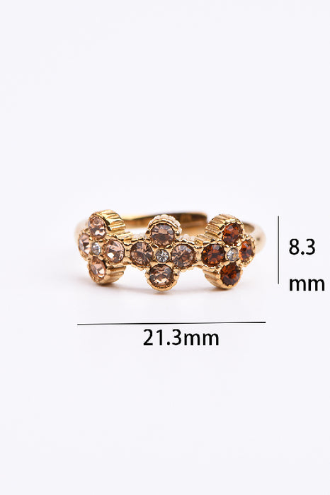 Ring Edelstahl vergoldet 3 Blumen Zirkonia Klasse 5A Violett- und Rosatöne