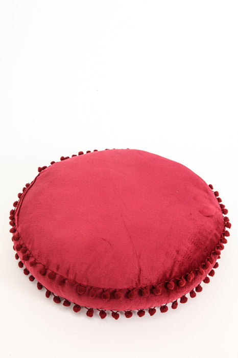 Coussin décoratif rond Pom Pom bordeaux